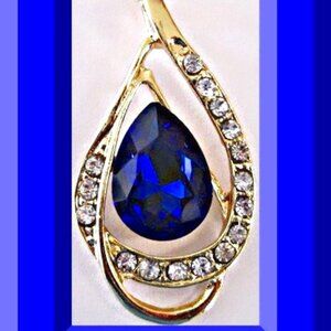 Gold Tone Tear Drop Design Necklace With Blue & Clear Crystals